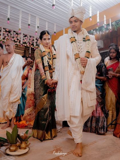 The couple takes their first steps together as husband and wife, a significant moment in any wedding. I focus on capturing the emotion and symbolism of this walk.