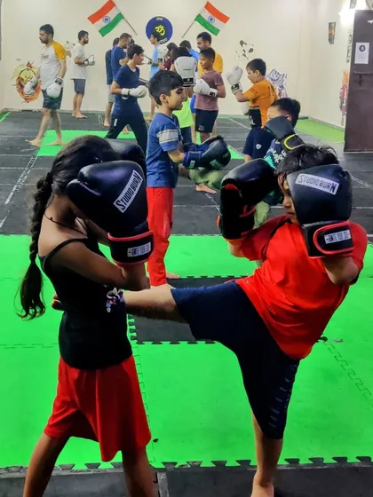 Our kids' anti-bullying program in action. Here, our young warriors practice their kickboxing drills, learning not just how to strike, but also discipline, coordination, and the confidence to stand tall.