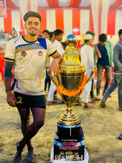 One of my best raiders posing with the trophy after JD Academy won the first position in the Jaunpur tournament.
