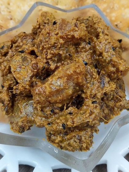 My Amla ka Achaar is both healthy and delicious. Here it is served with some crispy mathri. The Indian gooseberry is known for its health benefits, and I make it extra tasty with jaggery, green chillies, and ginger.