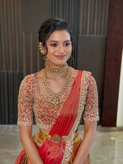 A portrait highlighting the soft glam makeup that enhances her natural features.