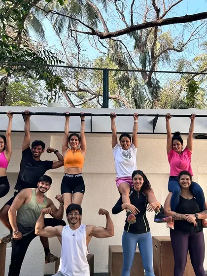 This picture says it all. We’re a community that gets strong, has fun, and supports each other, literally. This is the energy you can expect when you become one of the #PeopleOfTheSpace.
