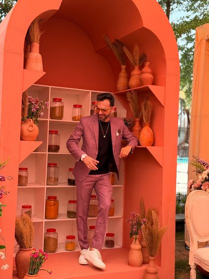 Suit up, show up, and never settle. A stylish shot of me in a pink suit, reflecting my confidence and modern fashion sense.