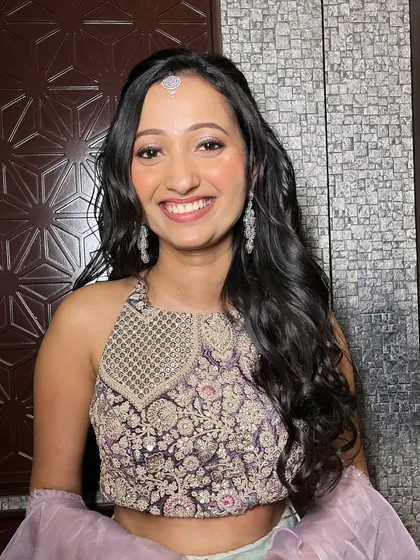 Her happy smile says it all. It was a pleasure creating this soft and elegant look for her special day.