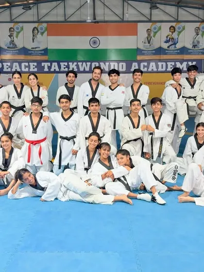 A fun team photo capturing the camaraderie and joy that is a core part of our academy's culture.