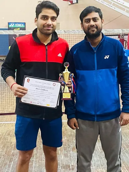 A closer shot of my player Himanshu Mittal and me after his victory at the U.P. Senior State Championship.