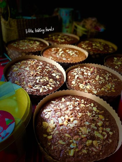 Another shot of my non-alcoholic whole wheat plum cakes, fresh from the oven. The tops are sprinkled with nuts for a lovely texture.