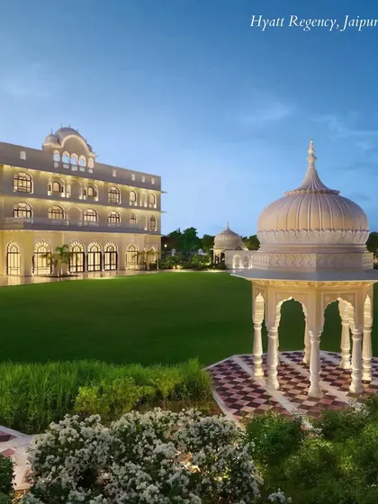 The sprawling lawns of the Hyatt Regency in Jaipur, with its beautiful white gazebos. This space is a blank canvas for a grand outdoor wedding ceremony or reception.