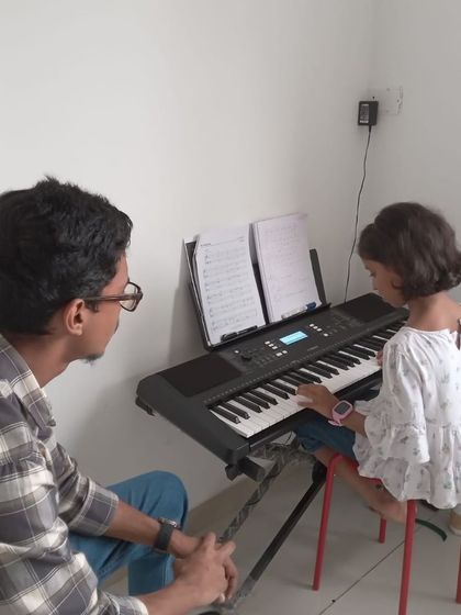 Another shot of a one-on-one keyboard lesson. We create a comfortable environment for students to learn and ask questions.