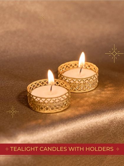 The beautiful tealight candles with golden holders from our "Festive Bundle". They add a warm, festive glow to any space.
