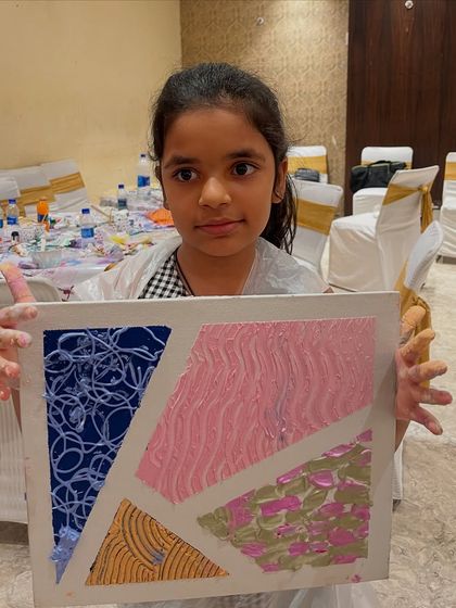 This student created a beautiful abstract piece using different colors and textures.