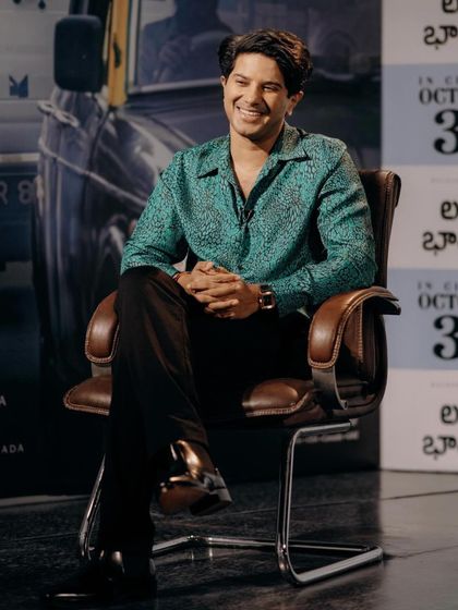 Dulquer Salmaan looking cool and comfortable during a 'Lucky Bhaskar' press conference. I chose this printed Shantanu & Nikhil shirt for a pop of color and personality.