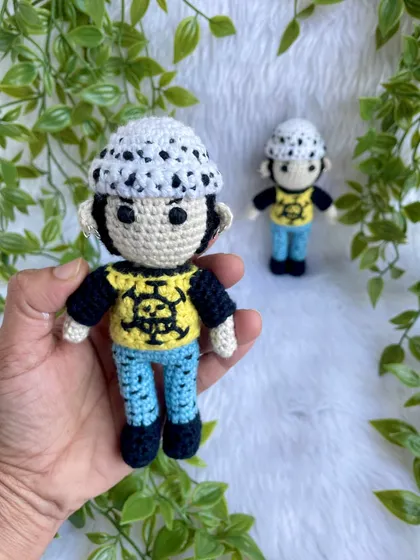 Here is Trafalgar Law, another character from One Piece. I paid close attention to his signature spotted hat and even his tiny ear piercings to make this anime replica authentic.