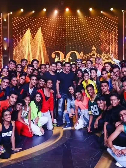 A group photo with Salman Khan and the entire dance troupe. The scale of these productions taught me everything about stage presence.