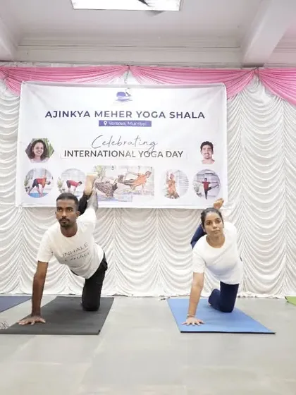 Our teaching team demonstrating a sequence during the International Yoga Day event. It takes a team to create such a wonderful experience for the community.