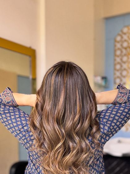 Rocking blonde hair is all about confidence. This stunning balayage is perfect for making a statement, with beautiful highlights that catch the light with every move.