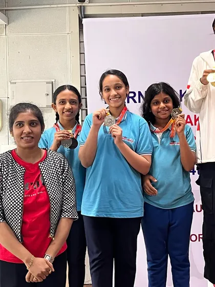 Our female shooters celebrating their impressive haul of medals at the state level Air Pistol NR match. Their collective success highlights the strength of our team.