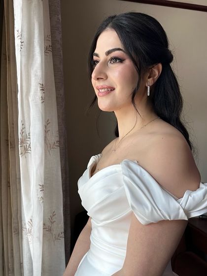 Another beautiful portrait of Ozlem. Her look is the epitome of classic, romantic bridal style.