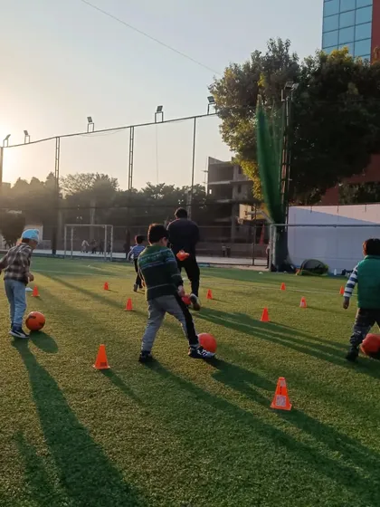 Our youngest players learning the basics of ball control through cone drills. Every session is a mix of hard work and fun.