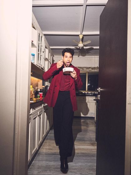 Even a quick snack break can be stylish. This candid of Siddhant in his full look shows how great styling translates from the red carpet to real life.
