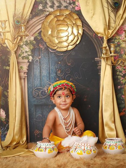 A full view of the magnificent Janmashtami setup, with little Krishna as the centerpiece. This shows the scale and detail I put into creating these thematic shoots.
