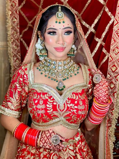 A final look at our happy and radiant bride. Her skin is glowing, and the makeup enhances her natural beauty.