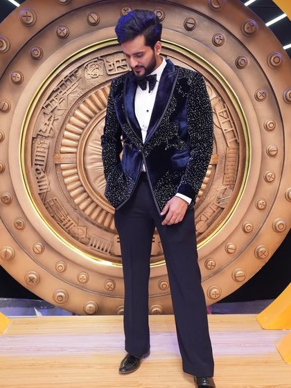 Another look at the custom navy blue velvet tuxedo for Abhishek Malhan. The rich fabric and tailored fit create a look of pure sophistication and style.