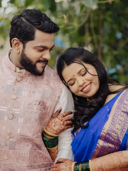 A sweet, romantic moment between the couple. Her makeup is soft and natural, ensuring she looks like the best version of herself.