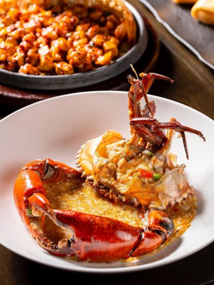 Another angle of the crab dish for Shang Palace, showing more detail of the sauce and presentation.