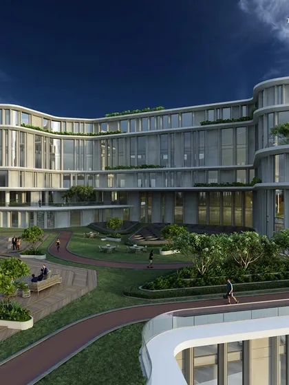A fusion of form and function, the flowing curves of this corporate headquarters redefine modern architecture. Each floor seems to float effortlessly, adorned with lush greenery that integrates sustainability with cutting-edge design.