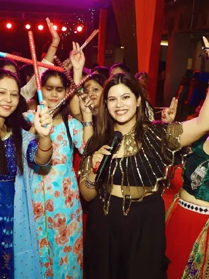 Having a blast at a Dandiya night. There's nothing like the energy of a crowd dancing with dandiya sticks in their hands.