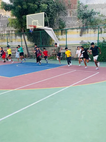 Players work on their agility and footwork with running drills.