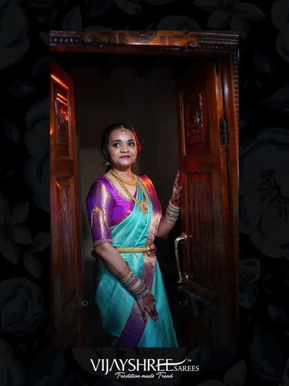 Shravya looking absolutely radiant. The rich contrast of the saree and the traditional jewelry makes for a perfect engagement look.