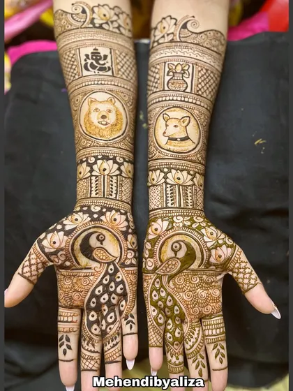 The full view of the engagement henna with pet portraits. The peacocks on the palms and the dogs on the arms make for a truly one-of-a-kind design.