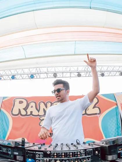 On the decks at the 'Rangrez' Holi event. Performing on a big stage like this, with my own branding, is a feeling like no other.