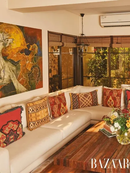 For Dia Mirza's home, we created a living space that felt like an embrace. The large L-shaped sofa is layered with handwoven cushions, and a large artwork brings color and energy. It’s a space that holds her stories, her art, and her quiet strength.