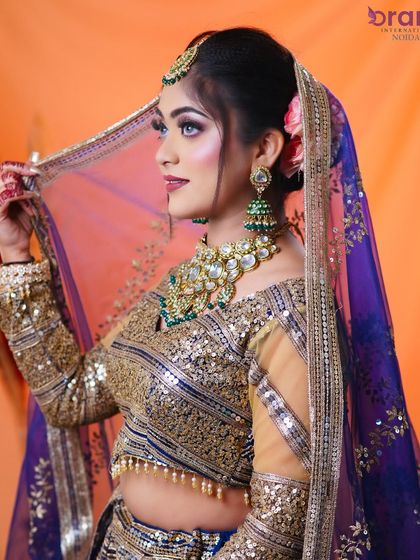 A side profile that captures the elegance of the bride, highlighting the hairstyle and the intricate jewelry.