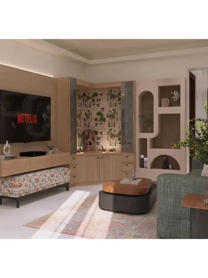 This living area design shows how we integrate different functions seamlessly. Here, a sleek TV console and a custom-designed mandir unit are combined with unique shelving, creating a perfect fusion of art, color, and purpose.