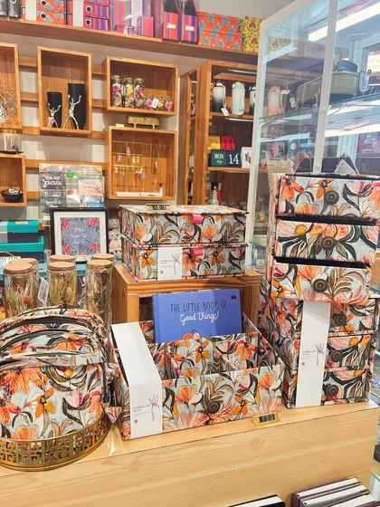 A glimpse of the full 'Darjeeling Sway' collection on display in our store. It includes storage boxes, desk caddies, organizers, and even a backpack, all in our custom floral print.