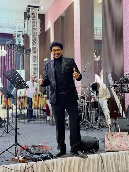 Black is not just a color, it's a vibe. Standing on stage before a show, this all-black outfit gives me the comfort, confidence, and class I need to own the stage.