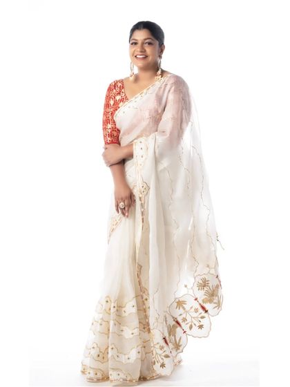The final look for Aparna Balamurali. The full view shows how the lightweight saree was draped to create a flowing, graceful silhouette.