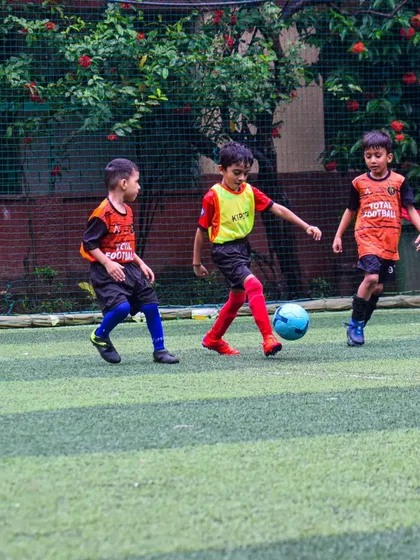 A young player from our U6 team dribbling with skill and determination.
