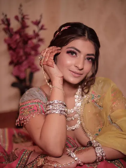 A beautiful portrait of our mehendi bride, looking like a Bollywood diva with her colorful makeup and stunning jewelry.