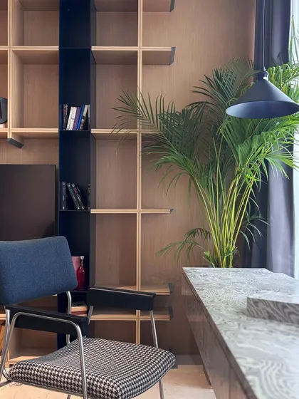 A detail shot of the workstation, showing how the natural light from the window creates a bright and pleasant area for work or study.