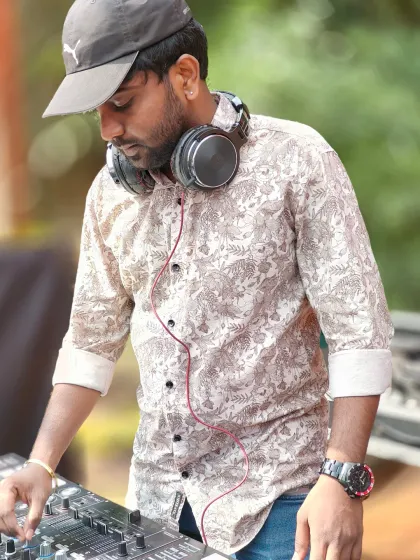 A close-up shot of me concentrating on the mix. Every transition is important to maintain the flow and energy on the dance floor.