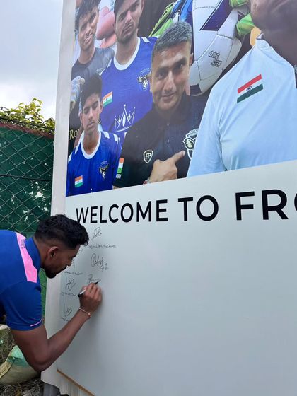 Another signature being added to our wall, a testament to the community we have built.