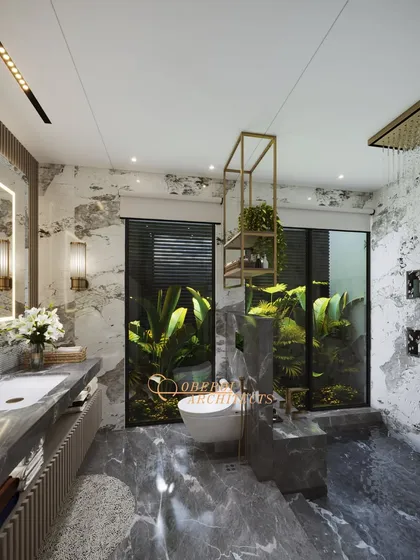 An oasis of luxury where natural elements meet modern design. This bathroom features a sunken tub, dramatic marble, and large windows looking out onto lush greenery.