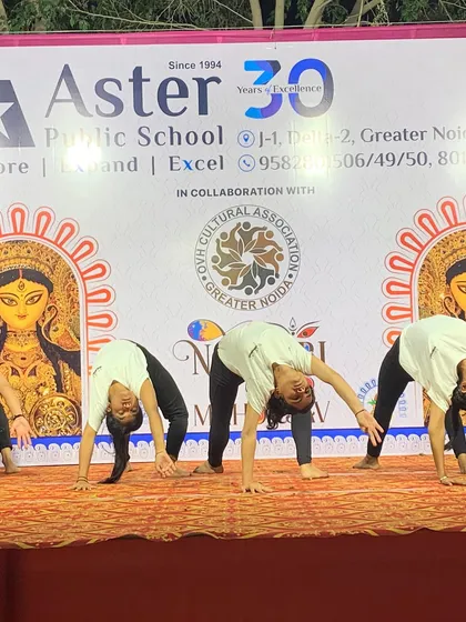 A synchronized forward bend sequence, showing the fluidity and grace we bring to our event performances.
