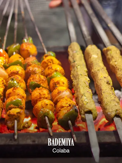 We believe everyone should enjoy our food. That's why our grills always have something for everyone. Here you can see our spicy Paneer Tikka grilling right next to our classic Chicken Seekh Kebabs over hot coals.