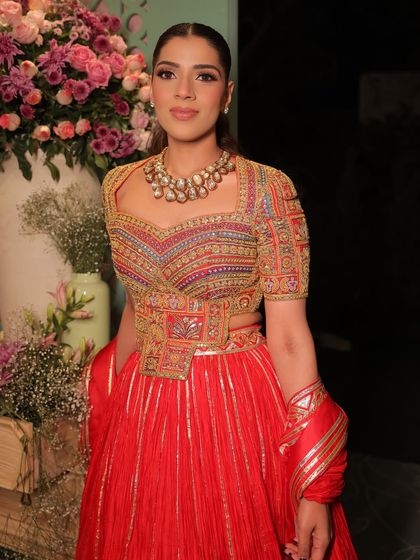 A beautiful three-quarter shot that captures the elegance and grace of the entire look.